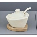 Zuccheriera ceramica bianca con base legno.