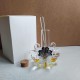 Profumatore vetro e cigni  cristallo con placca,compreso di bastoncini tappo e scatola.MIS.10x10 cm